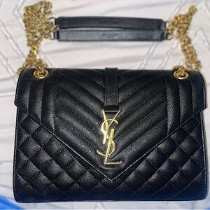 COPY - Saint Laurent small, quilted envelope bag.